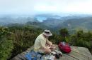 Randall dining on the summit of Hirakimata, Aotea